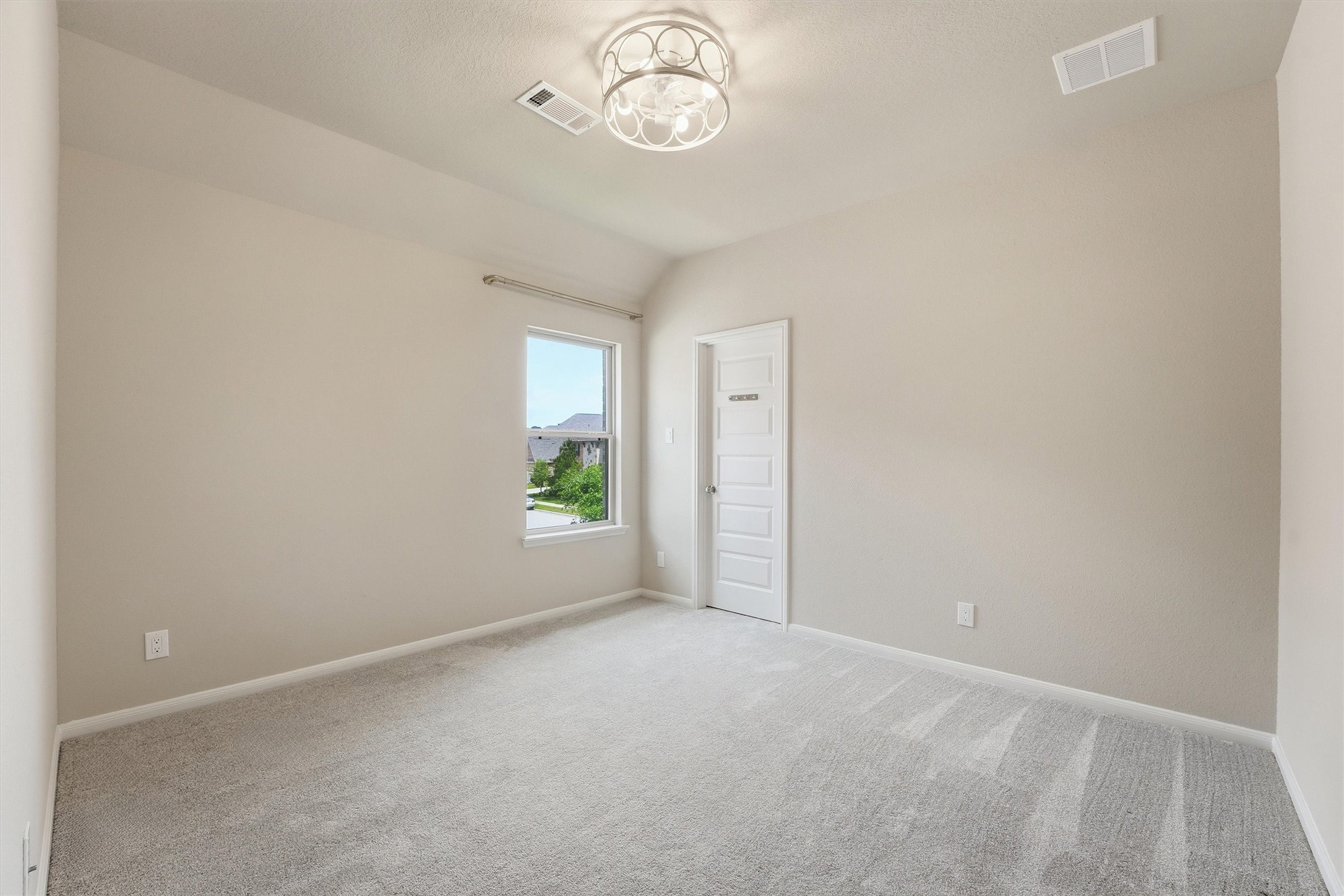 8673 Burdekin Road Magnolia, TX 77354 - Photo 41 of 50 Bedroom #4 has a pretty decorative ceiling fan and lighting and a walk in closet.