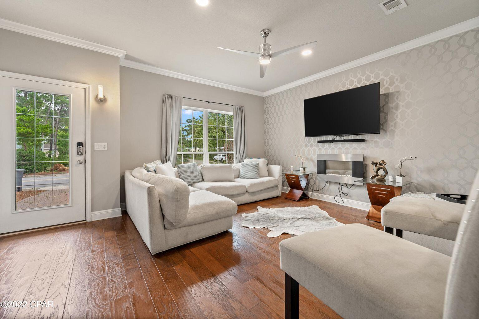11 Topside Drive Inlet Beach, FL 32461 - Photo 11 of 31 a living room with furniture and a flat screen tv