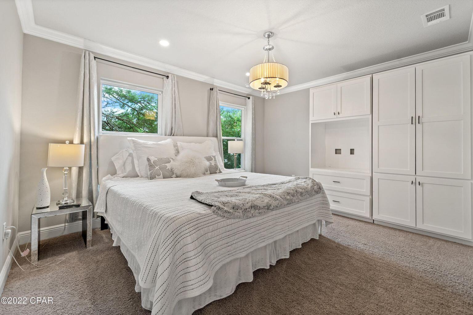 11 Topside Drive Inlet Beach, FL 32461 - Photo 22 of 31 a bedroom with bed and a window