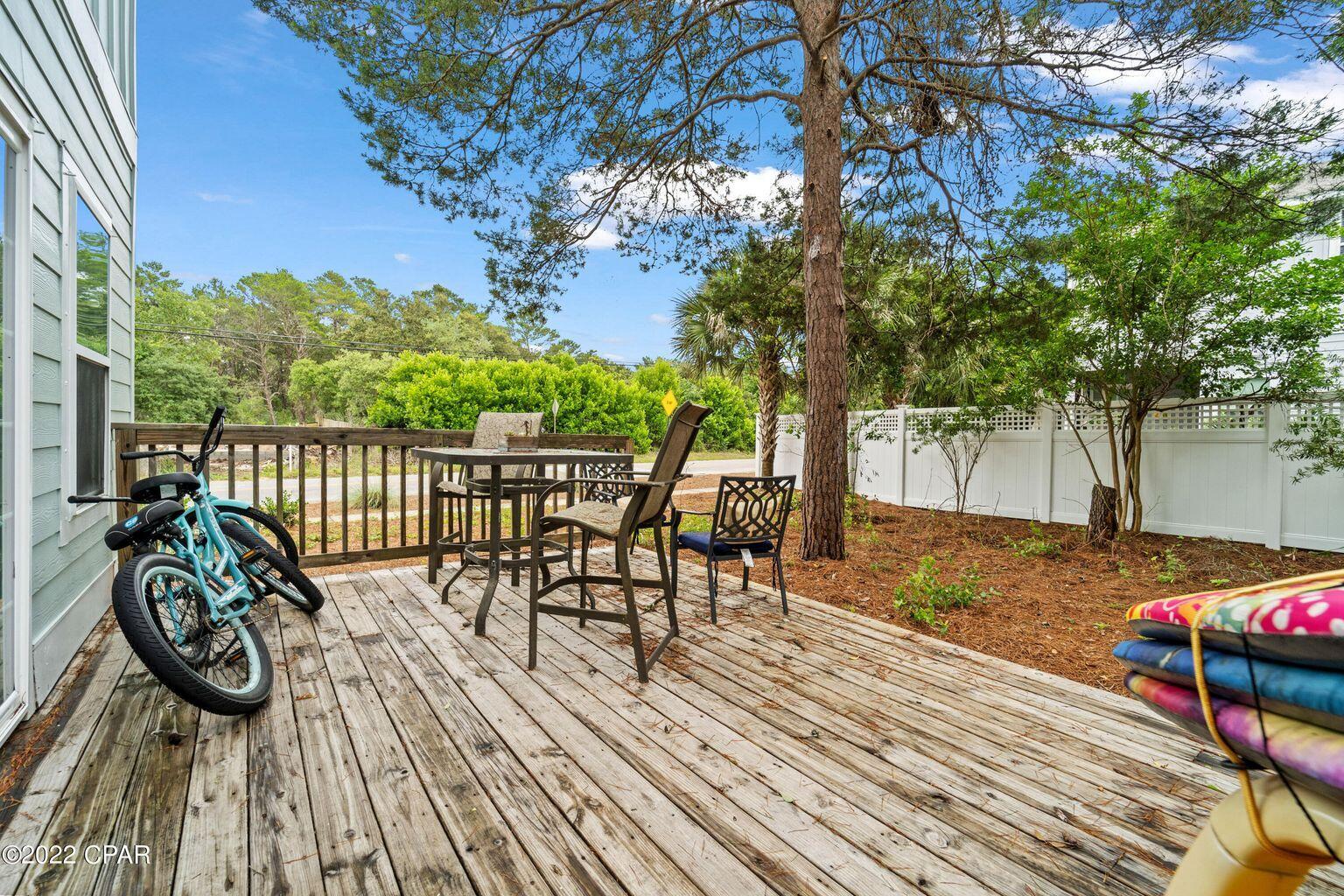 11 Topside Drive Inlet Beach, FL 32461 - Photo 24 of 31 a view of a chairs and table on the wooden floor