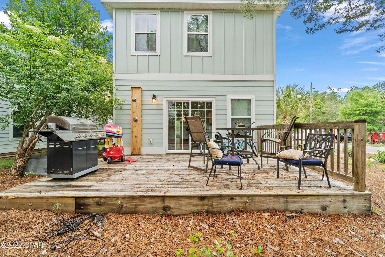 11 Topside Drive Inlet Beach, FL 32461 - Photo 25 of 31 a view of a house with backyard porch and sitting area