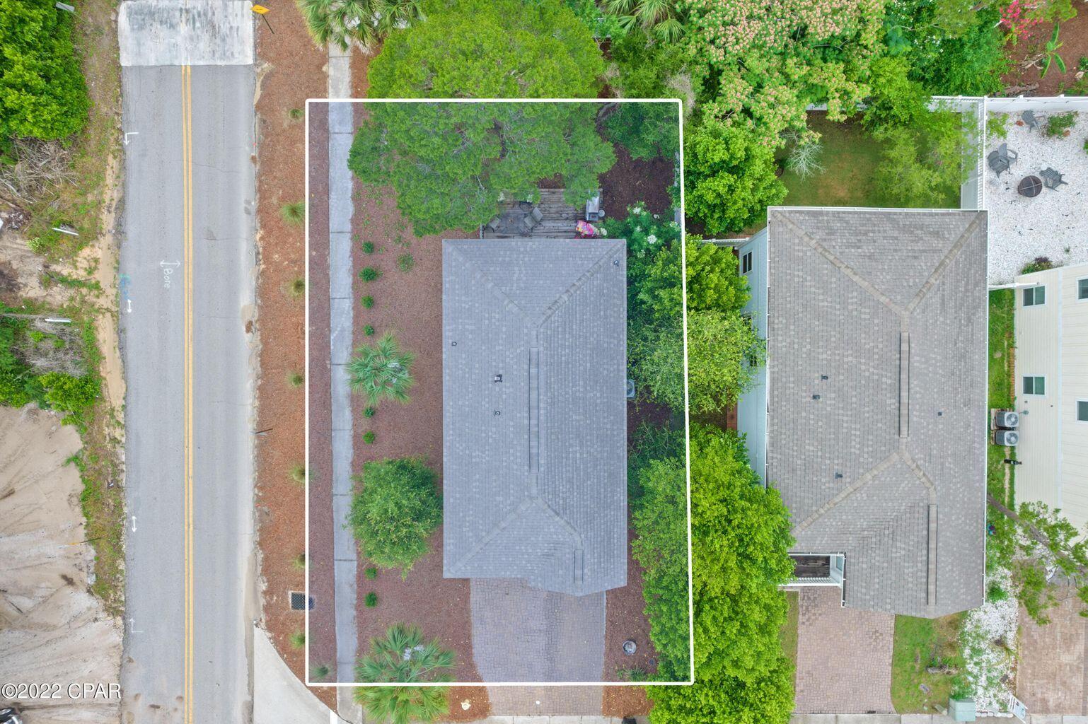 11 Topside Drive Inlet Beach, FL 32461 - Photo 26 of 31 a view of a house with a small garden and plants