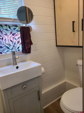 a bathroom with a toilet and a sink