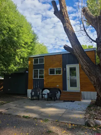 a house view with a backyard space