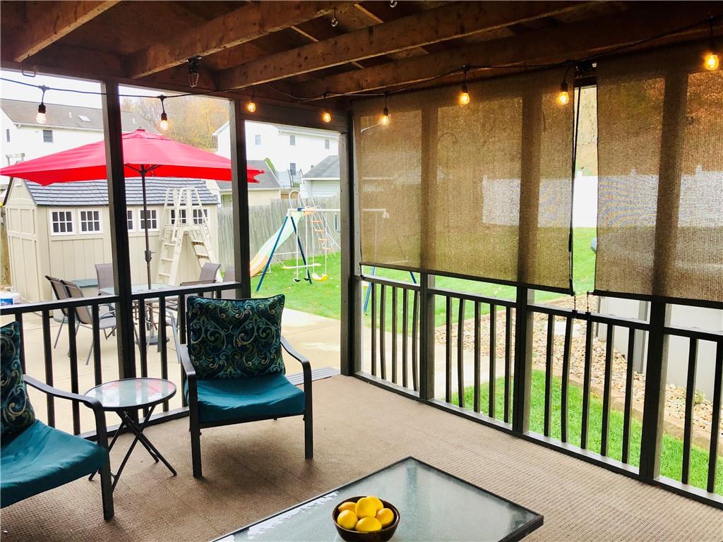 213 Sandworks Road Hunker, PA 15639 - Photo 20 of 25 Deck leads to Extended Patio area outdoors.