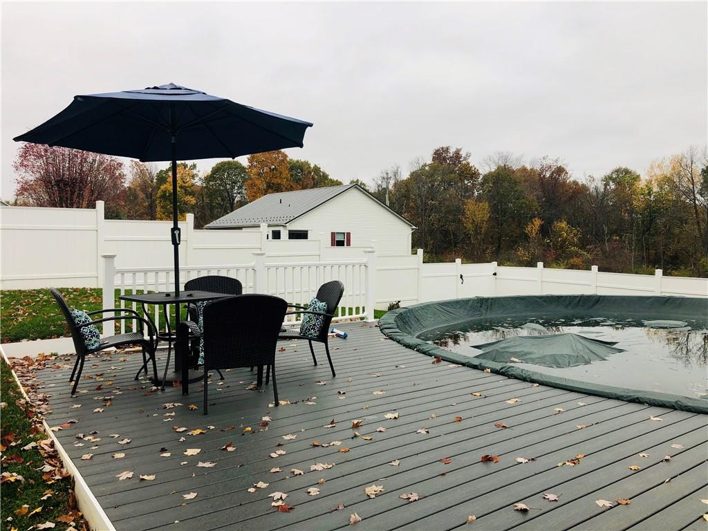 213 Sandworks Road Hunker, PA 15639 - Photo 23 of 25 Fabulous Deck to the Large Above Ground Pool.