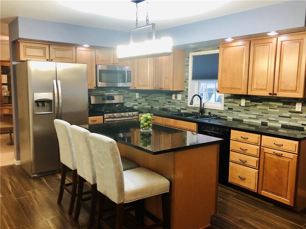 213 Sandworks Road Hunker, PA 15639 - Photo 5 of 25 Updated Kitchen Fully Applianced with Counter Island