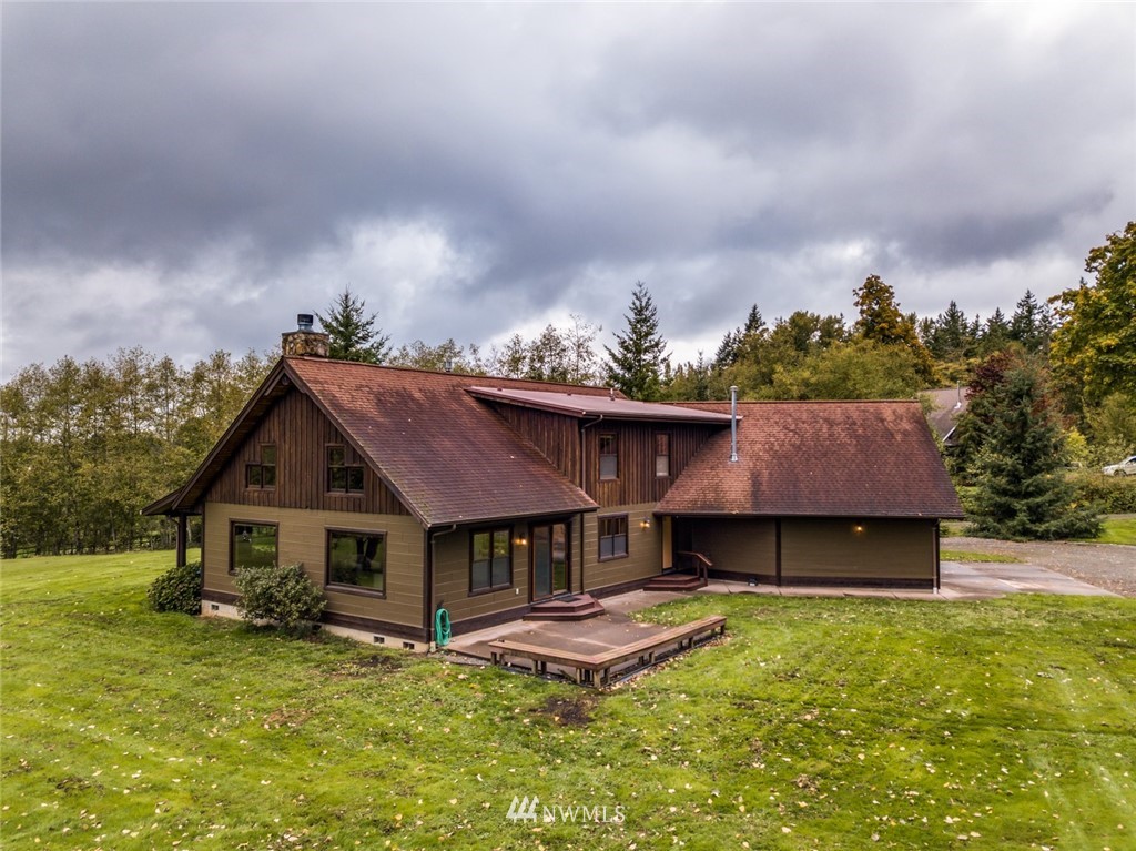 6570 North Star Road Ferndale, WA 98248 - Photo 2 of 39 a view of a house with a yard balcony and sitting area