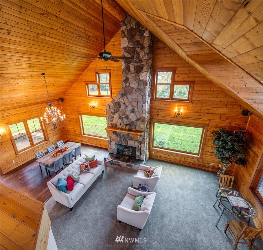 6570 North Star Road Ferndale, WA 98248 - Photo 11 of 39 a living room with furniture and a fireplace