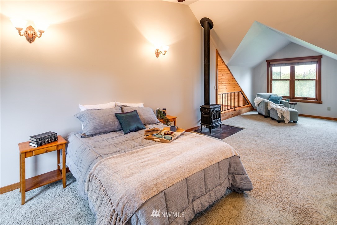 6570 North Star Road Ferndale, WA 98248 - Photo 12 of 39 a bedroom with bed and a window