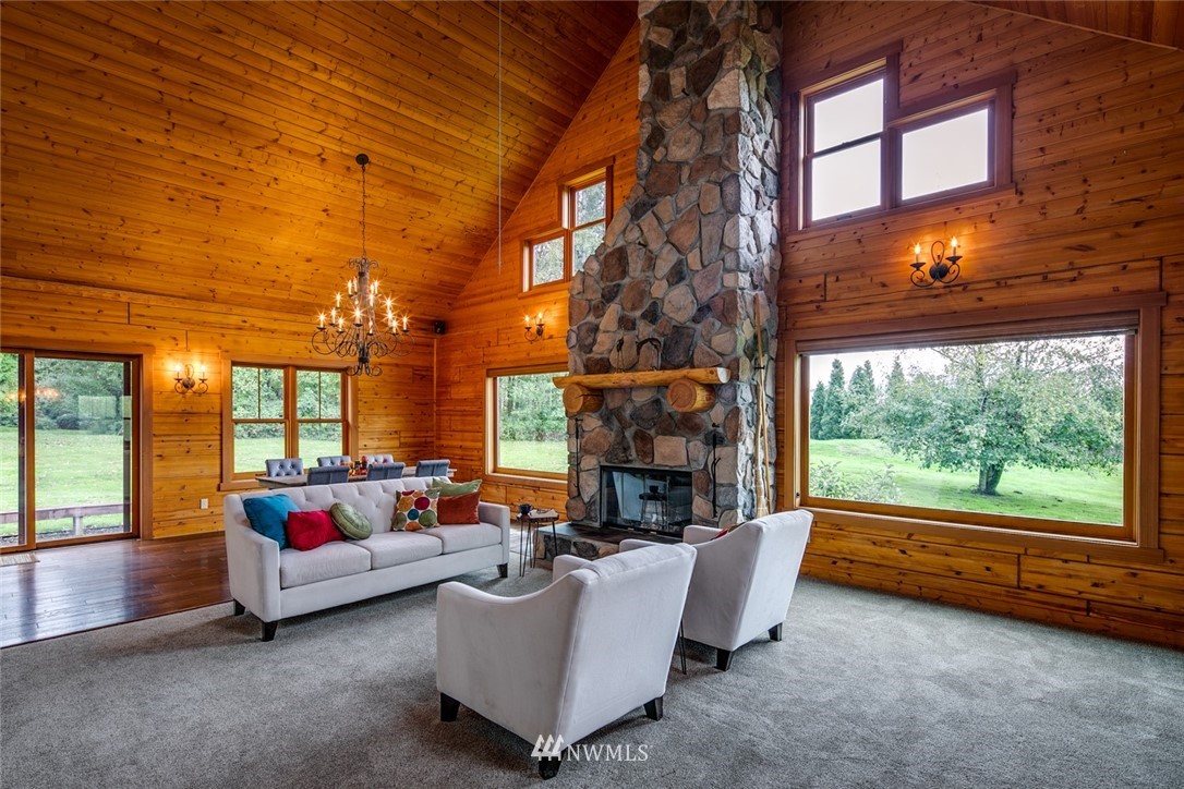 6570 North Star Road Ferndale, WA 98248 - Photo 4 of 39 a living room with furniture and a fireplace