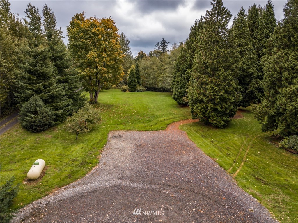 6570 North Star Road Ferndale, WA 98248 - Photo 34 of 39 a view of a golf course with a trees