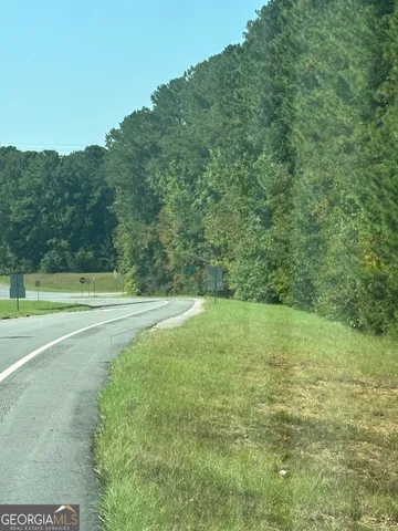 a view of swimming pool from a balcony