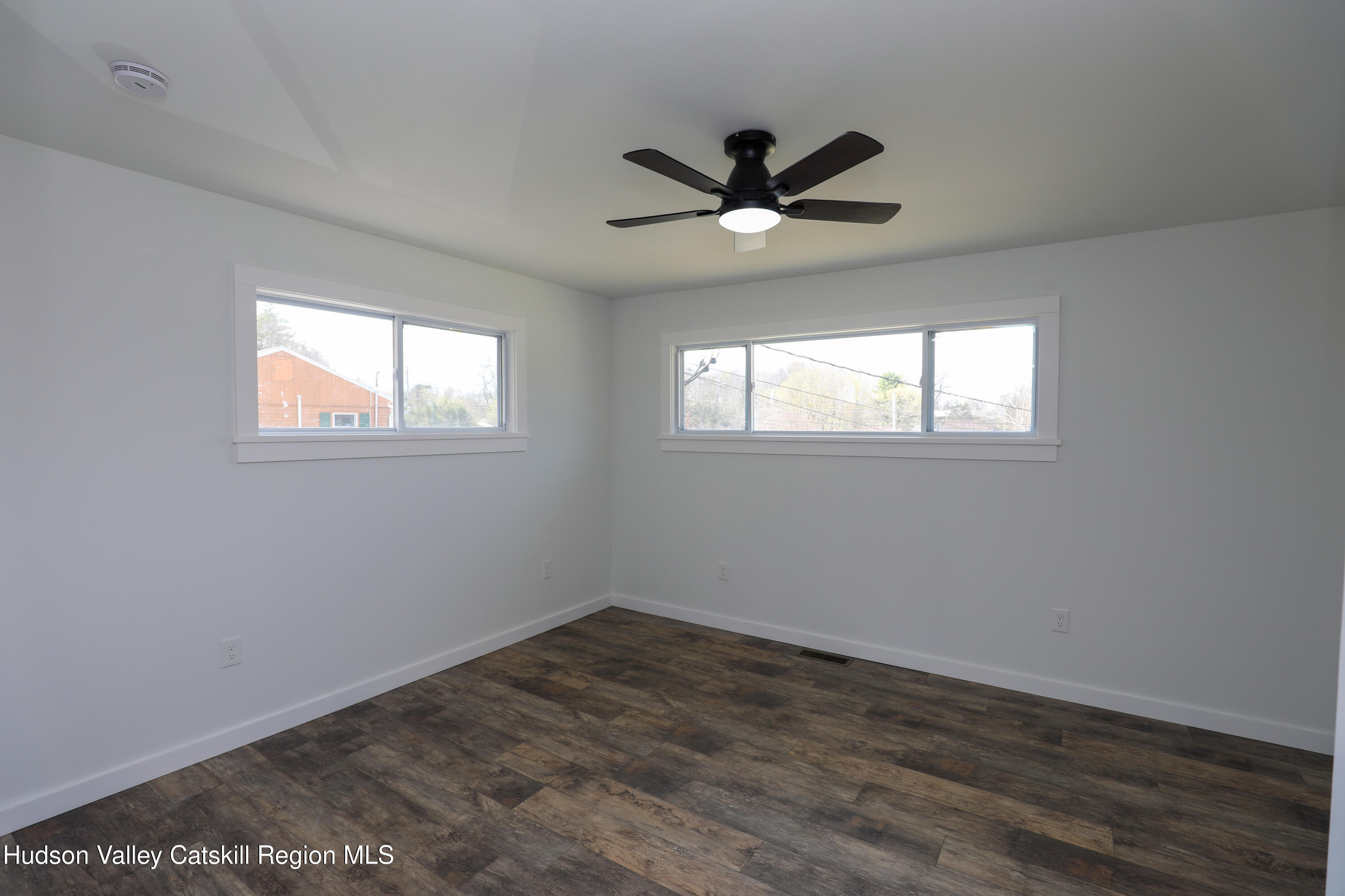 111 Zandhoek Road Hurley, NY 12443 - Photo 11 of 33 a view of empty room with wooden floor and window