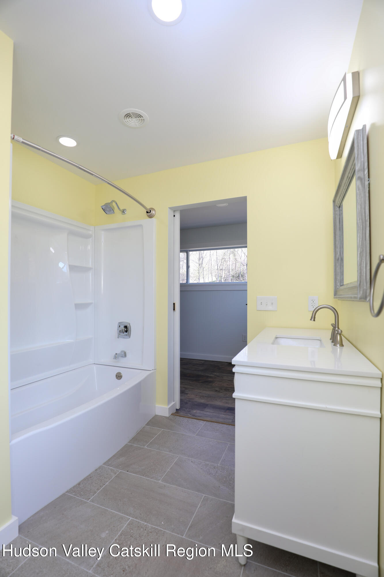 111 Zandhoek Road Hurley, NY 12443 - Photo 14 of 33 a bathroom with a sink a toilet and bathtub