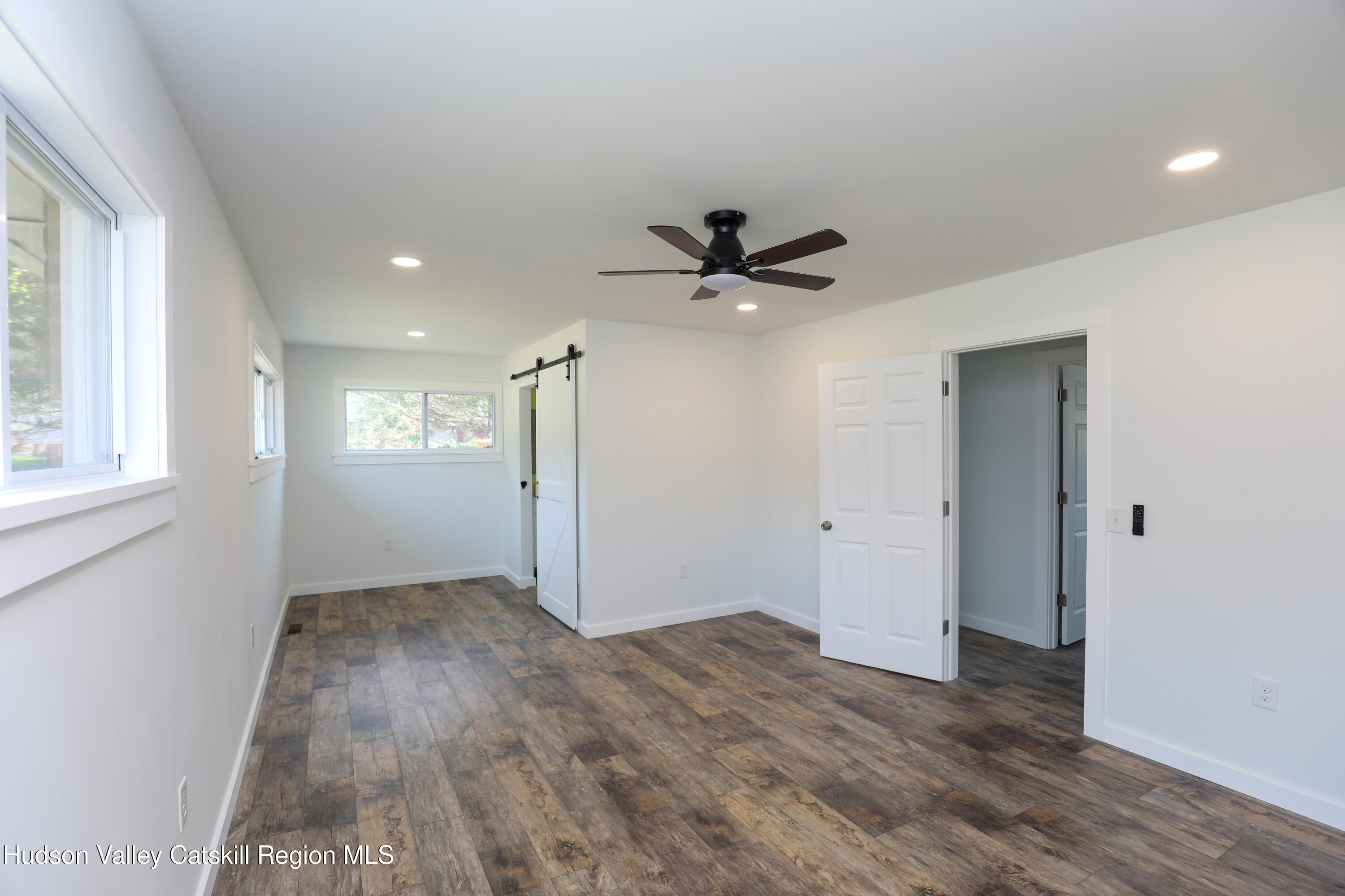 111 Zandhoek Road Hurley, NY 12443 - Photo 18 of 33 wooden floor in an empty room with a window
