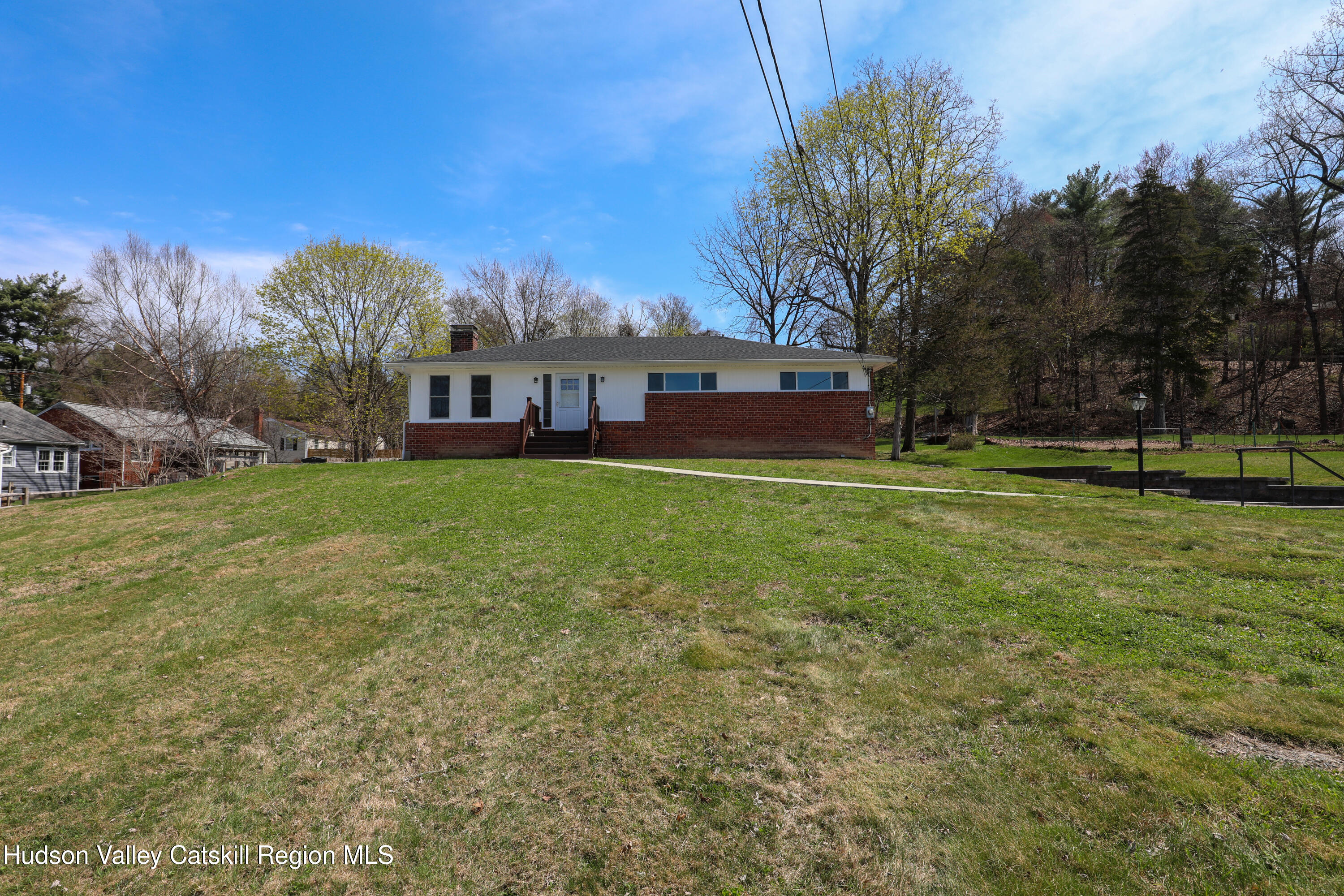 111 Zandhoek Road Hurley, NY 12443 - Photo 2 of 33 a view of a house with a big yard and large trees