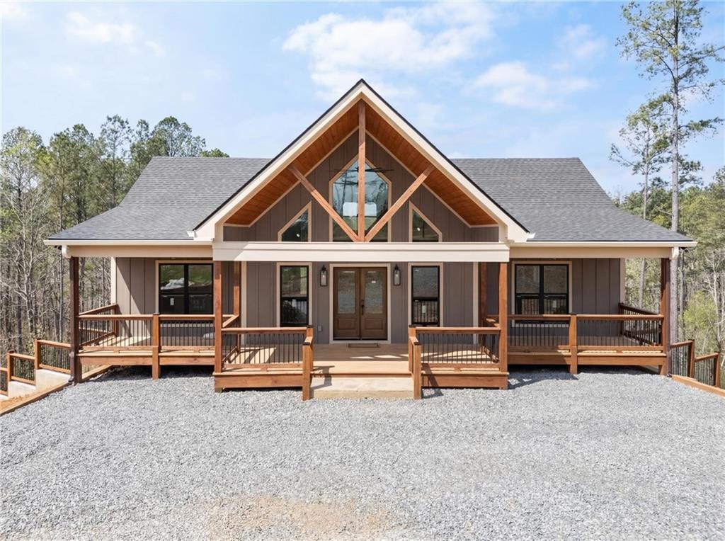 2956 Blalock Mountain Road Talking Rock, GA 30175 - Photo 1 of 65 a front view of a house with a yard