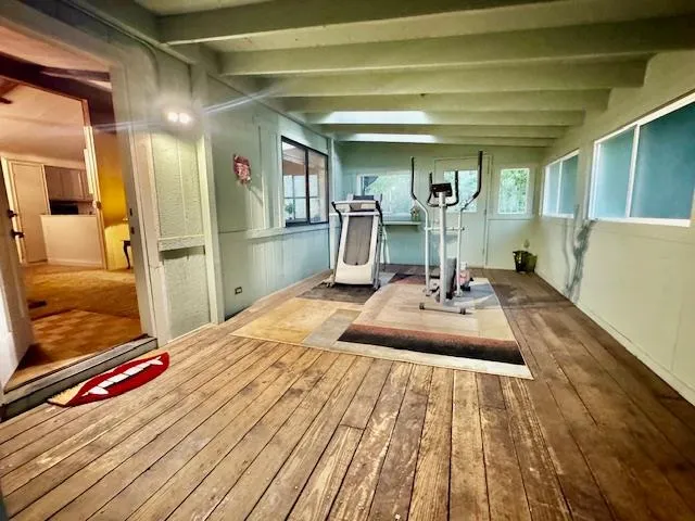 a view of a room with gym equipment