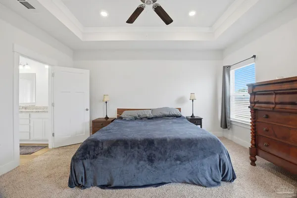 a bedroom with a bed and closet