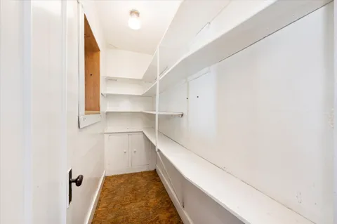 a hallway with closet