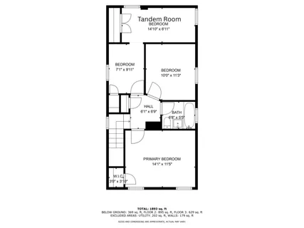 a front view of a house with a yard table and chairs