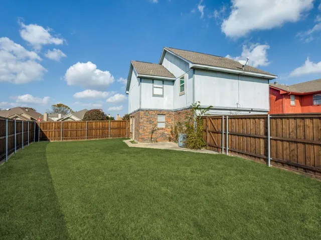 a view of a porch with a yard