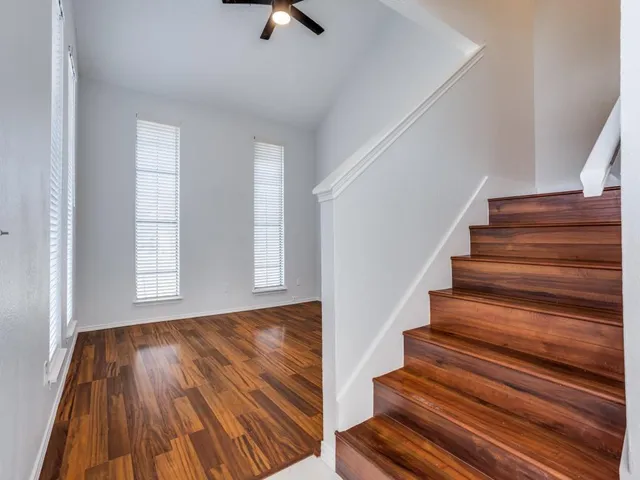 a view of entryway with wooden floor