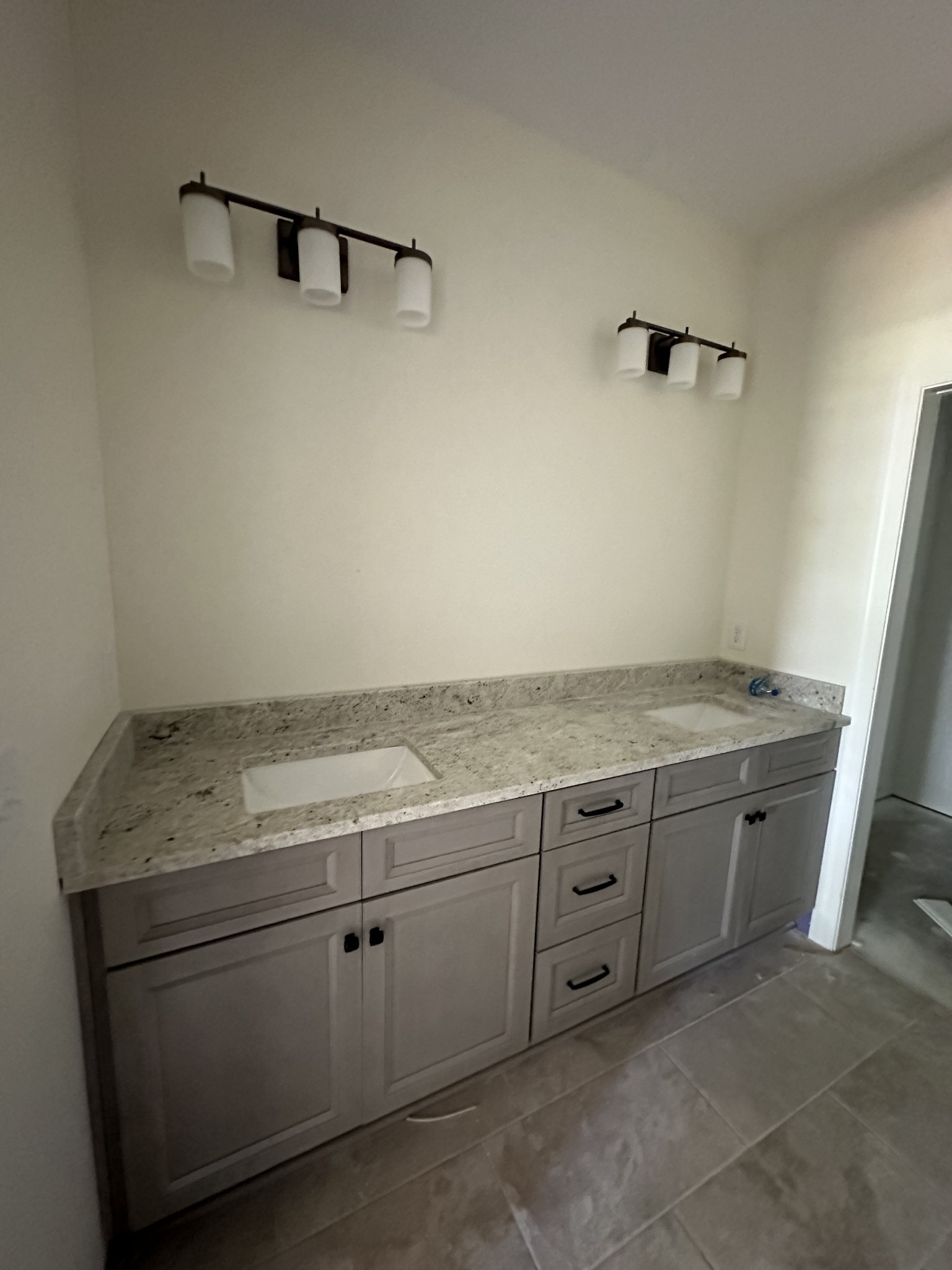 483 West Foxrun Springfield, TN 37172 - Photo 13 of 15 a utility room with granite countertop cabinets washer and dryer