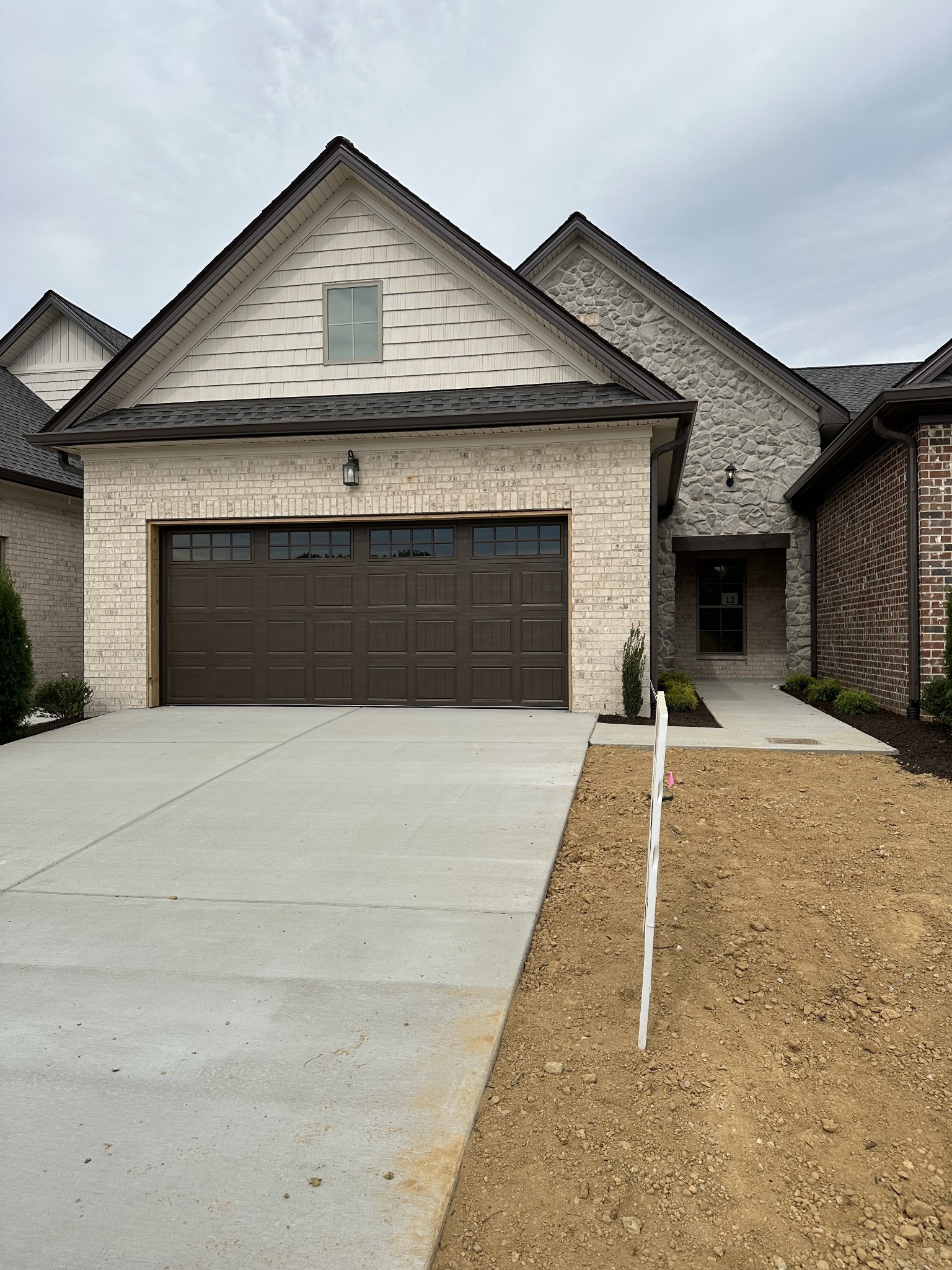 483 West Foxrun Springfield, TN 37172 - Photo 14 of 15 a front view of a house with a yard and garage