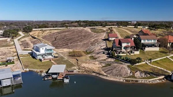 a view of a lake with a house