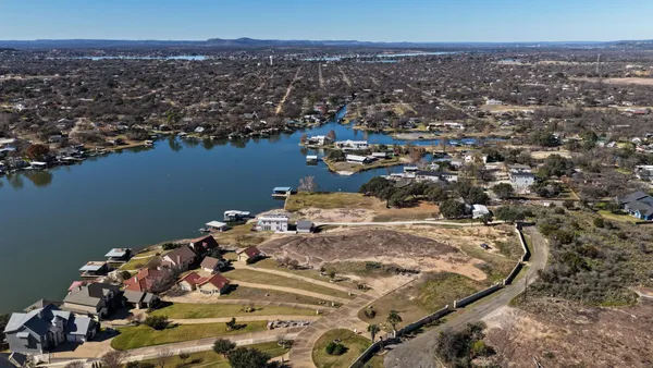 a view of a lake with a city view