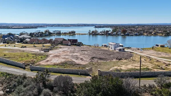 a view of a lake with houses