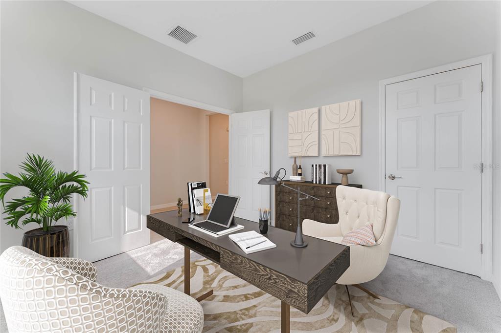 9592 Starling Loop Leesburg, FL 34788 - Photo 11 of 34 a workspace with furniture and potted plant