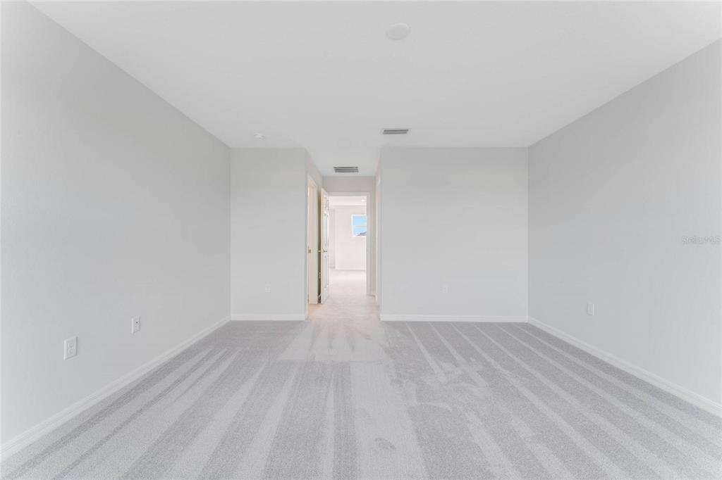 9592 Starling Loop Leesburg, FL 34788 - Photo 32 of 34 a view of an empty room