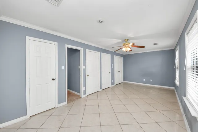 a view of an empty room and window