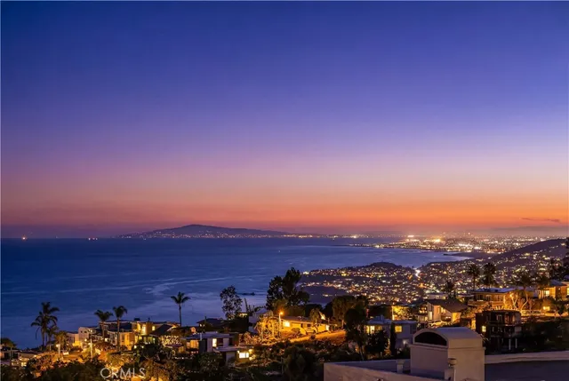 a view of a livingroom with furniture and a window
