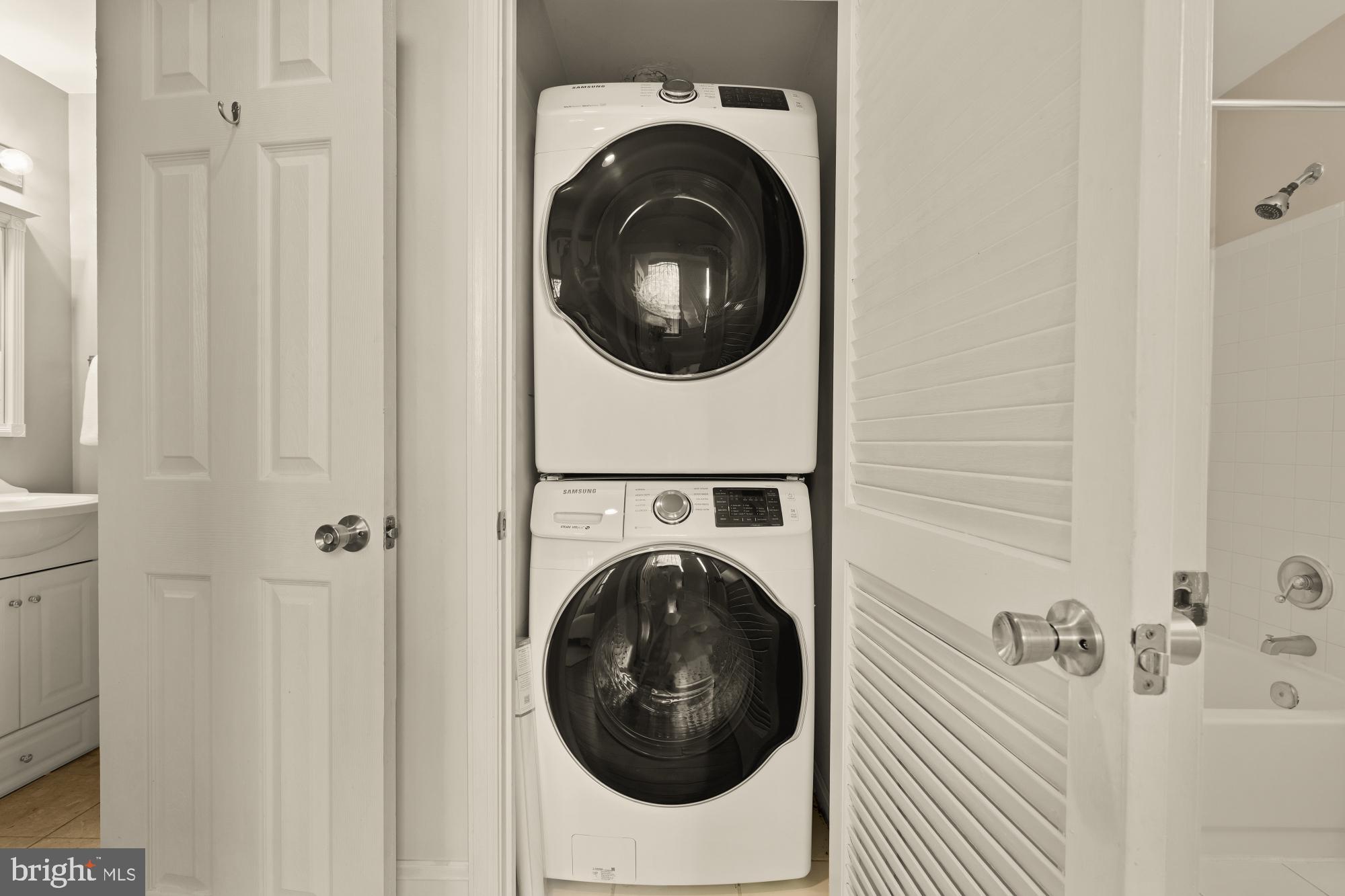 1715 15th Street Northwest, Unit 101 Washington, DC 20009 - Photo 12 of 24 a utility room with dryer and washer