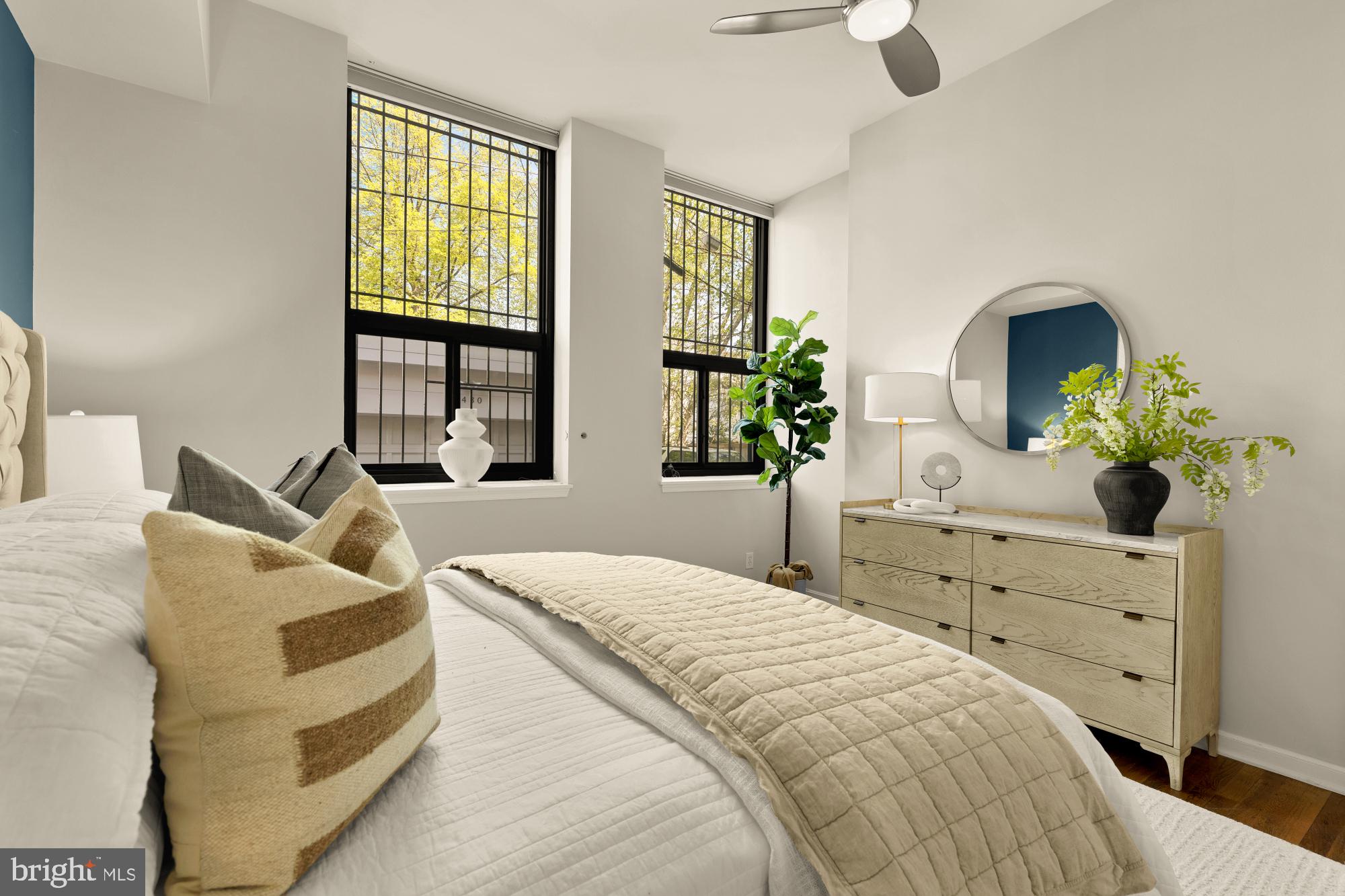 1715 15th Street Northwest, Unit 101 Washington, DC 20009 - Photo 7 of 24 a bedroom with a bed and window