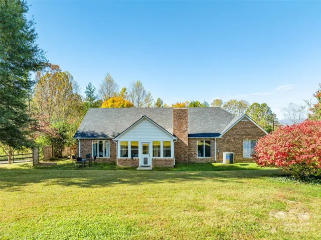 a front view of a house with swimming pool