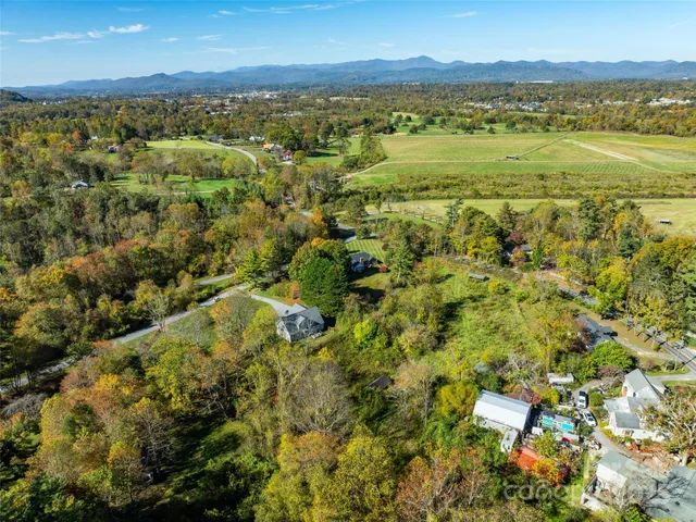 a view of a city with a lake