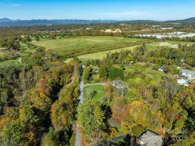a view of a city with mountains in the background
