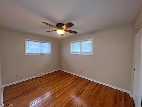 11701 Fordham Road Garfield Heights, OH 44125 - Photo 7 of 19 master bedroom has fresh paint and features natural hardwood flooring, ceiling fan, ample closet space.