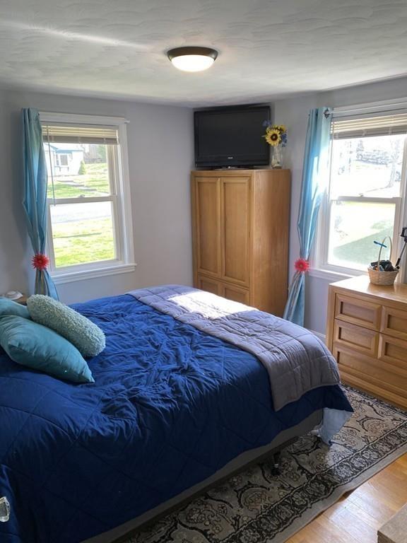 15 Bainridge Road Worcester, MA 01602 - Photo 17 of 40 a bedroom with a bed and a window
