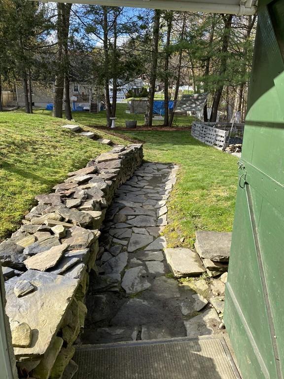 15 Bainridge Road Worcester, MA 01602 - Photo 26 of 40 a view of a yard with fountain