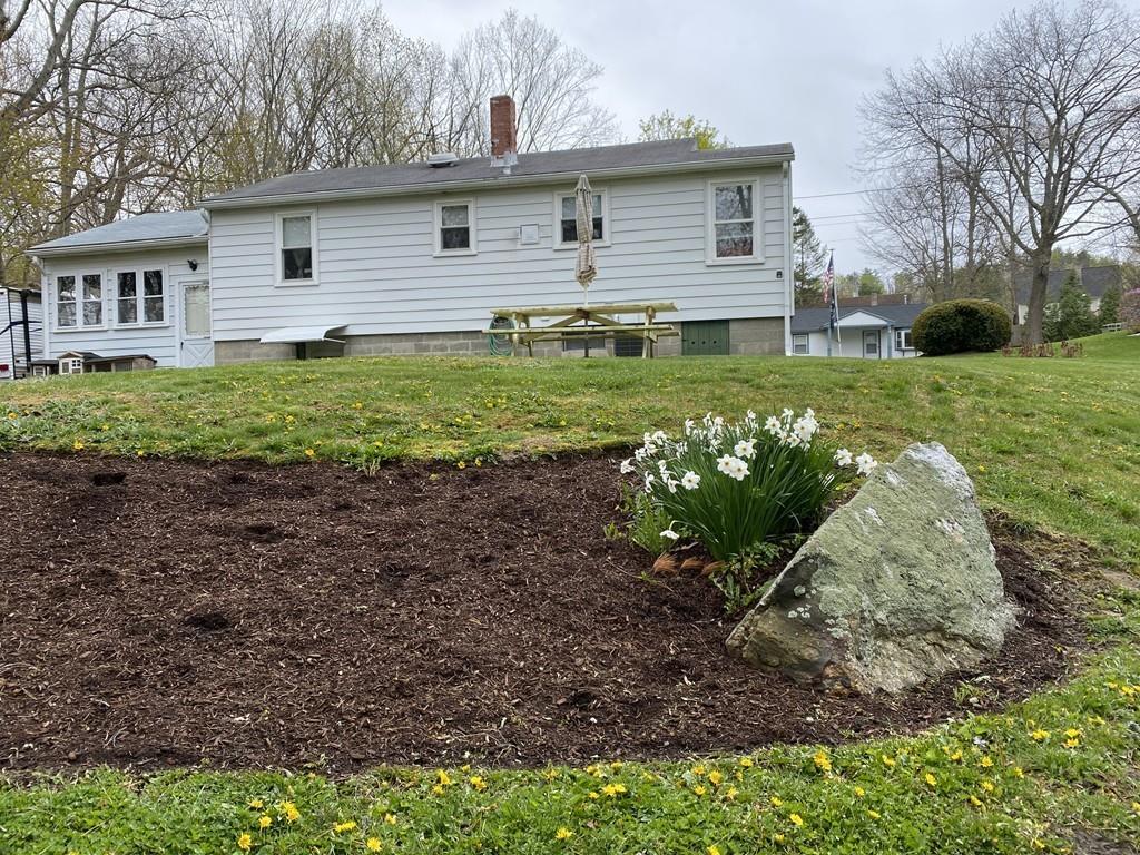15 Bainridge Road Worcester, MA 01602 - Photo 30 of 40 a front view of a house with garden