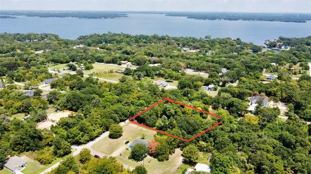 an aerial view of a houses with outdoor space and street view