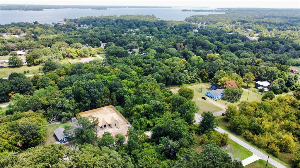 1159 Bora Bora Street Tool, TX 75143 - Photo 3 of 12 an aerial view of a house with a yard