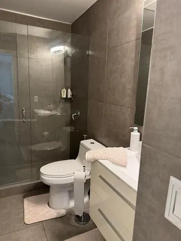 a view of a livingroom with wooden floor