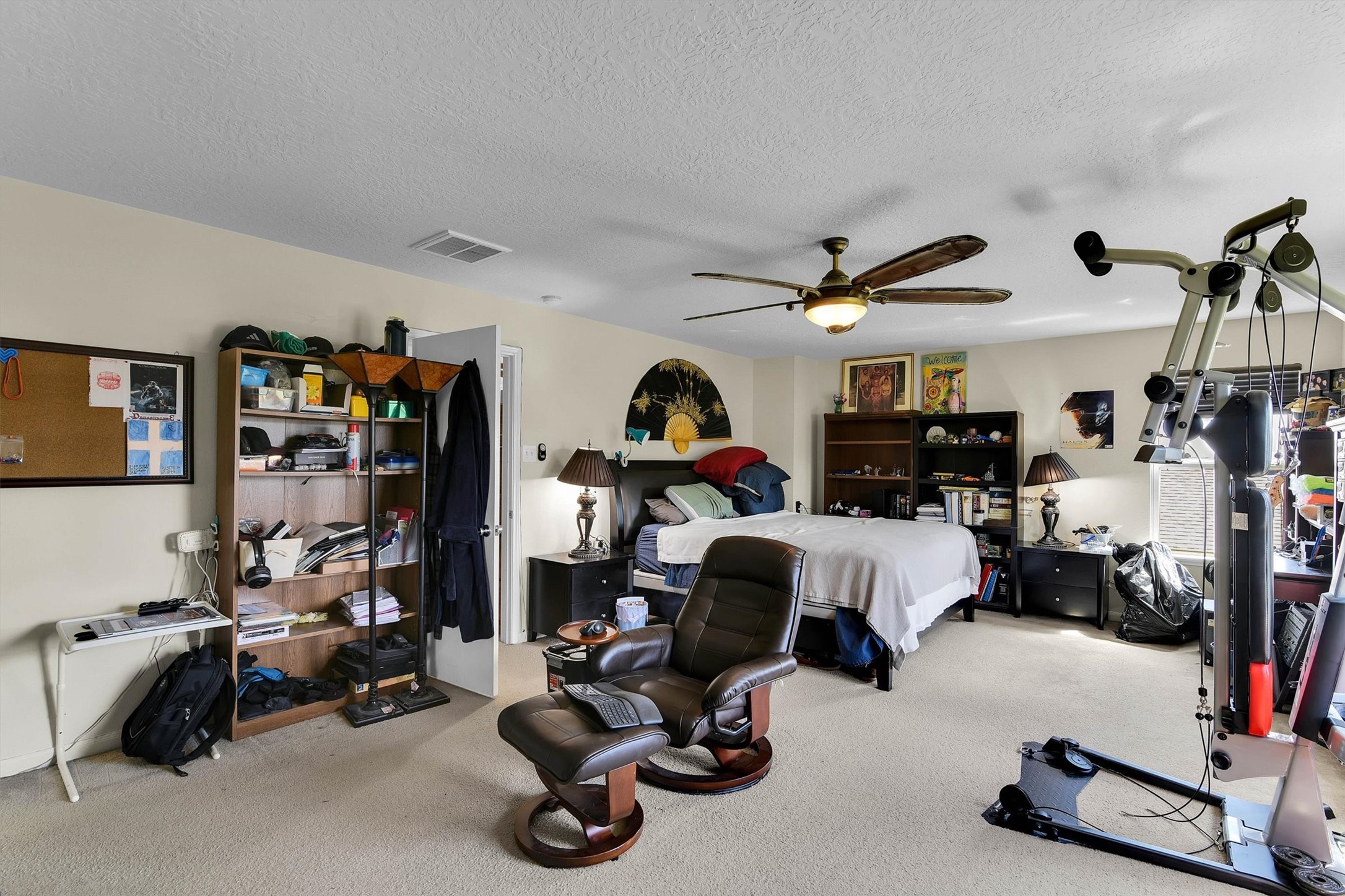 3003 Legends York Drive Spring, TX 77386 - Photo 20 of 29 a view of a room with gym equipment